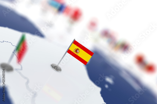 Obraz na plátně Spain flag in the focus. Europe map with countries flags