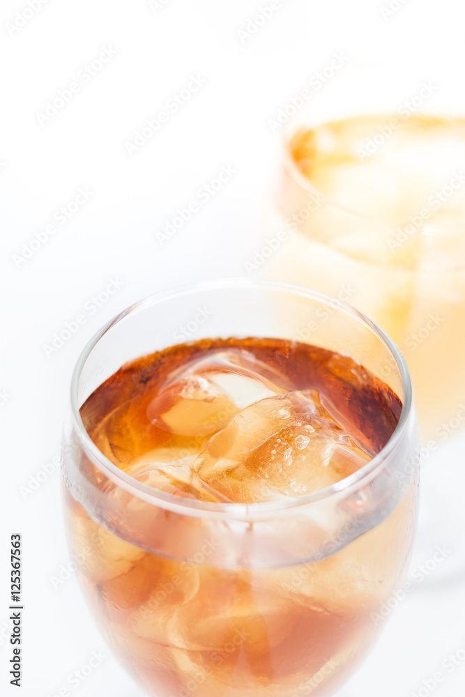 soft drink and ice cubes soft drink and ice cubes