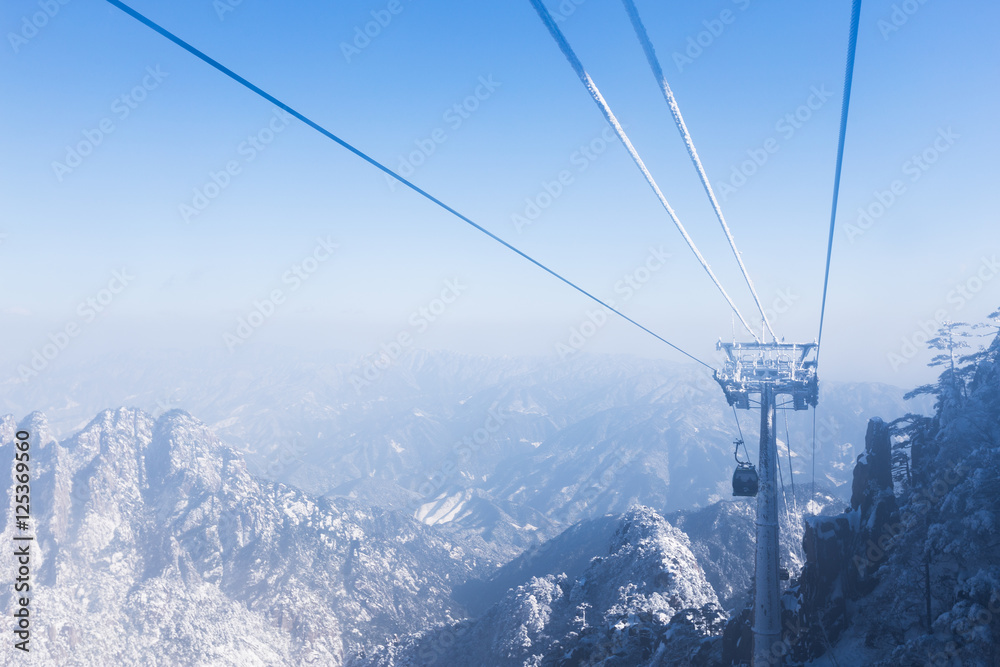 snow scene on huangshan mountain from cable car