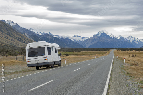 Motorhome on Mount Cook Road (State Highway 80) along the Tasman River leading to Aoraki / Mount Cook National Park and the village © jiggotravel