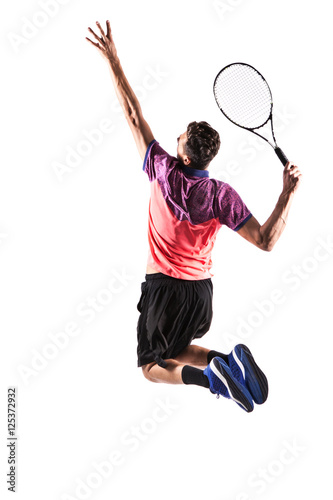 Young man playing tennis © takoburito