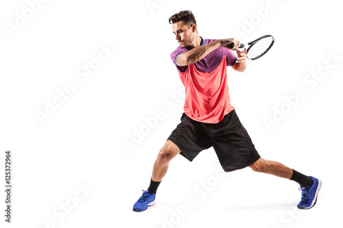 Young man  playing tennis © takoburito