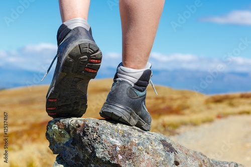 hiking boots on the rock in the mountains