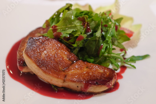 Grilled foie gras steak with green salad