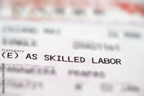 Japan work permitted as skill labor label in visa sheet in passport book