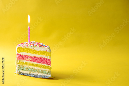 rainbow butter cake over yellow background