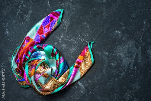 Silk scarf on a black background photo