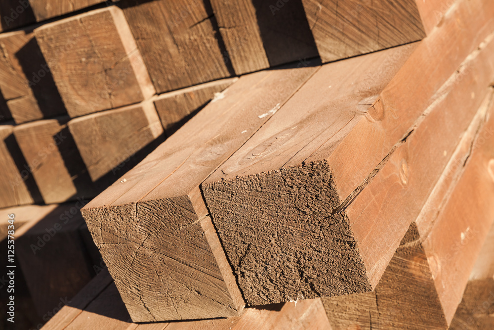 Stacked wooden beams, construction Stacked wooden beams, construction