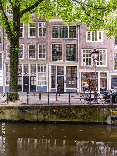 Urban Amsterdam, dutch town houses by a canal