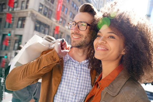 Cheerful couple doing shopping in Manhattan, New York city