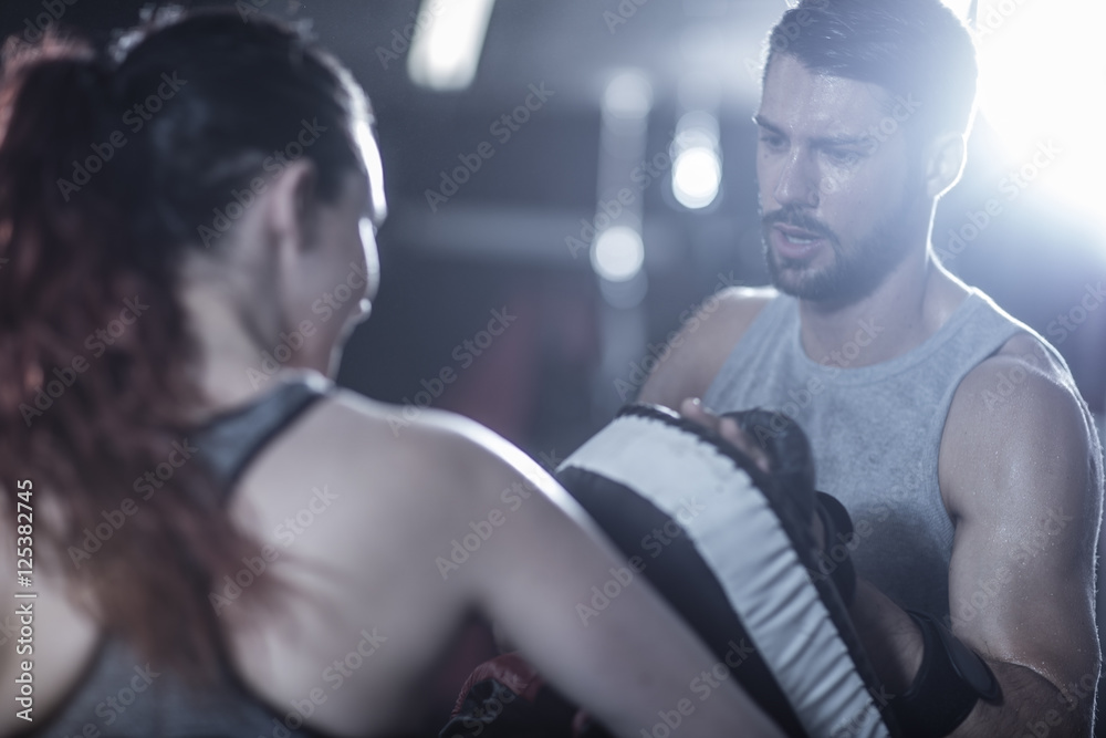 Coach with female boxer Coach with female boxer