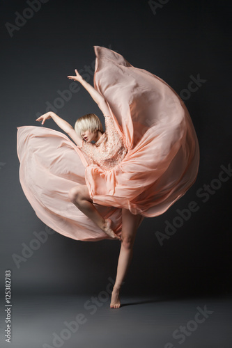 Woman dancing in chiffon dress