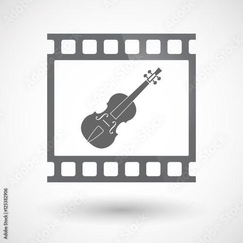 Isolated 35mm film frame slide photogram with  a violin