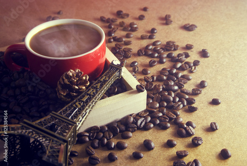 hot of coffee and pine cone eiffel tower photo