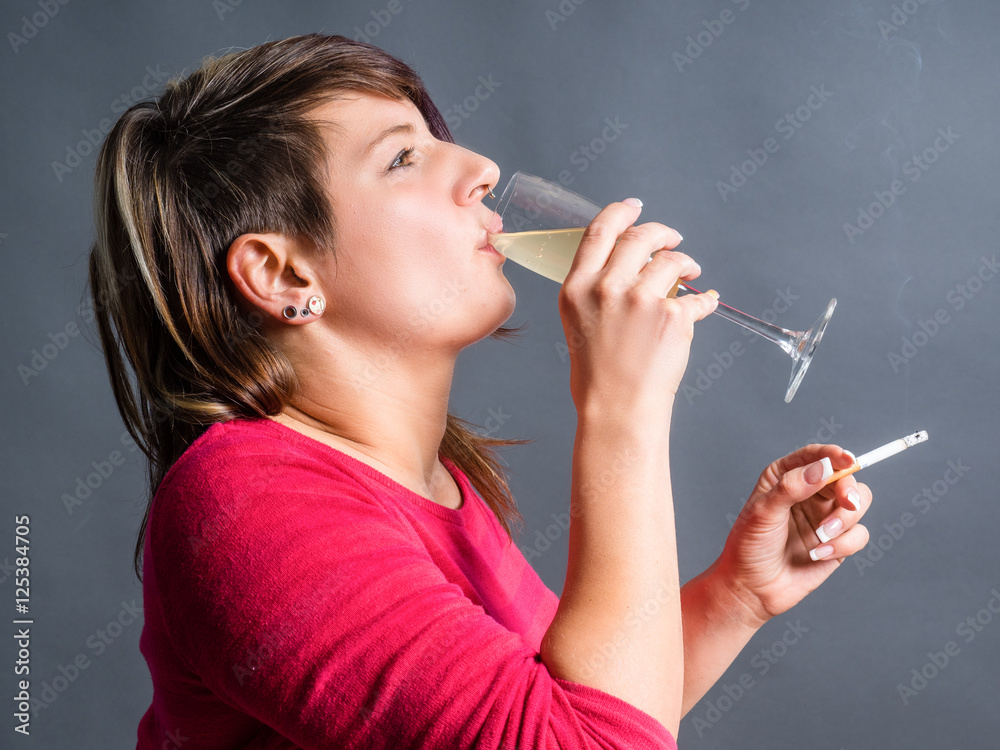 Fototapeta premium pregnant woman is drinking Alcohol.