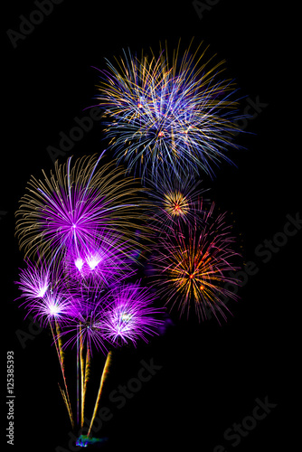 colorful fireworks -  beautiful colorful firework isolated display for celebration happy new year and merry christmas on black isolated background