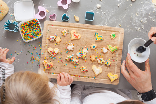 family bakes christmas cookies