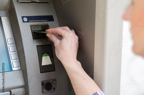 girl using atm