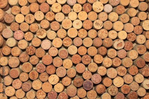 many different wine corks in the background