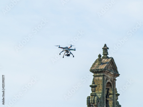 Innovation - A drone over a bell tower