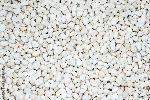 Shining smooth natural white stones for use as background.