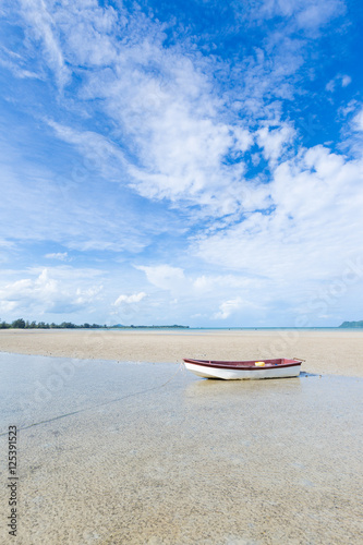 small boat on the beach © vachiraphan