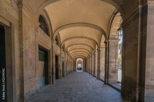 Archway underneath the Ancient building in barcerona - spain