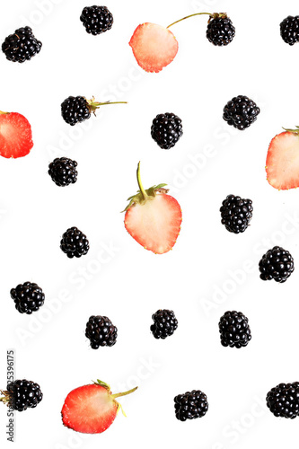 Fototapeta Naklejka Na Ścianę i Meble -  blackberry and strawberry berries on a white background top view of a flat style summer fresh berries pattern