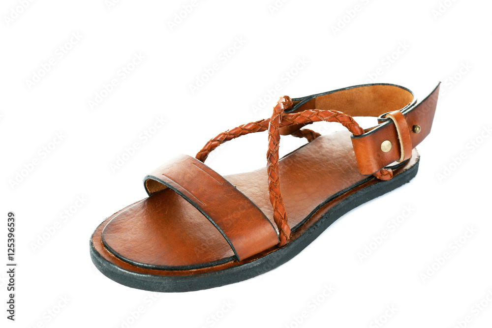 Naklejka premium Brown leather sandal isolated on white