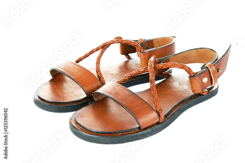 Brown leather sandals isolated on white