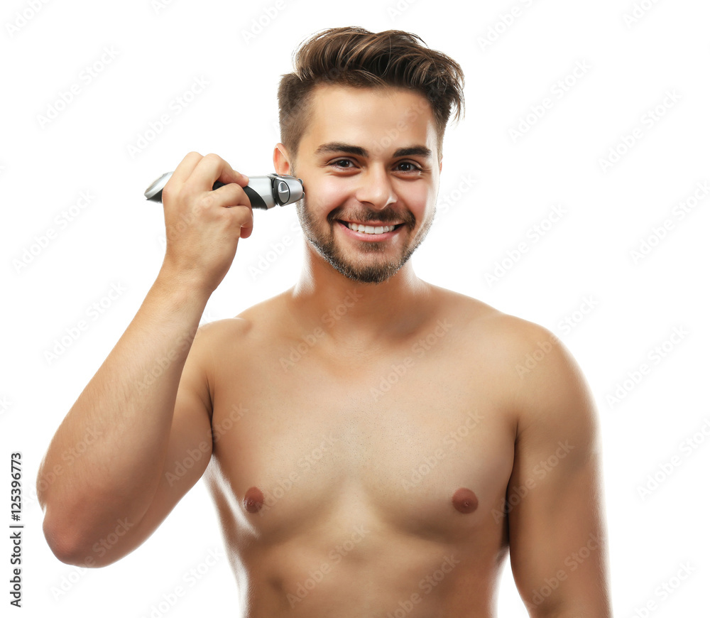 Fototapeta premium Handsome man shaving isolated on white