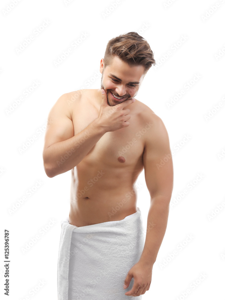 Fototapeta premium Handsome man in towel isolated white