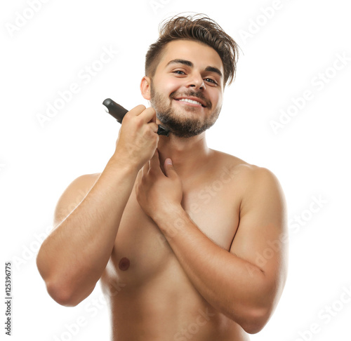 Handsome man shaving isolat...