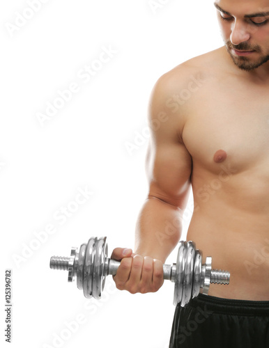 Sporty man with dumbbell isolated on white