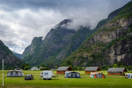 Camping at norwegian fjord with mountains background, Eidfjord.