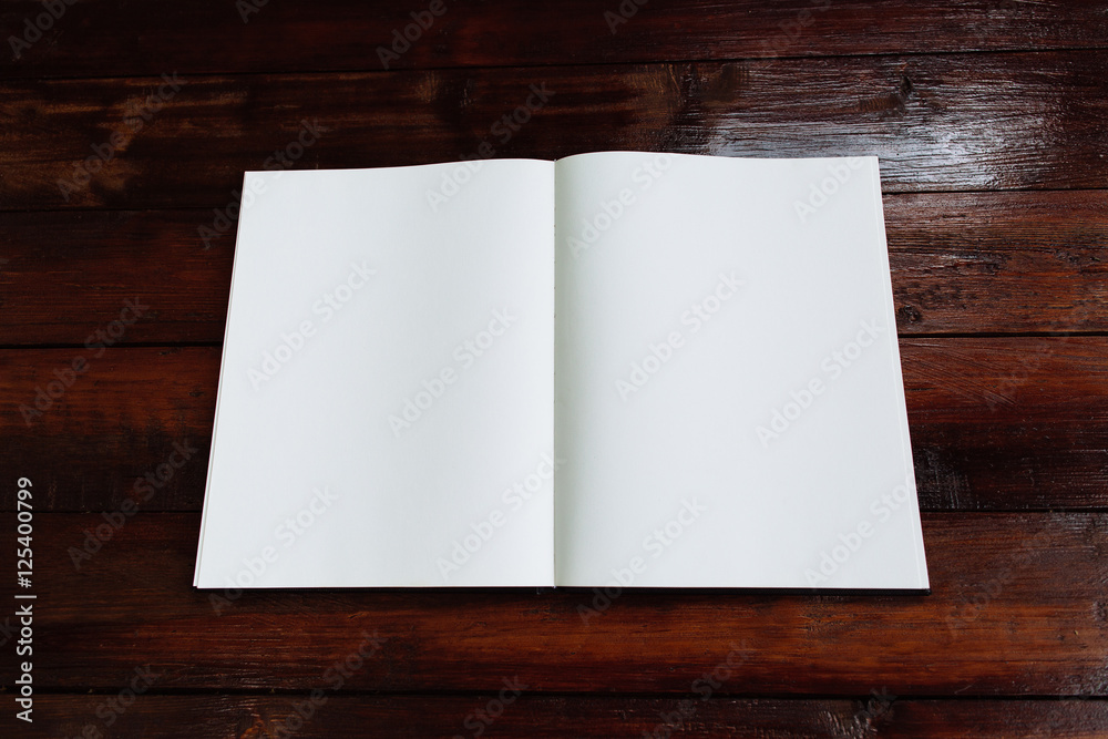 Open notebook on a wooden desktop - Mock up Open notebook on a wooden desktop - Mock up