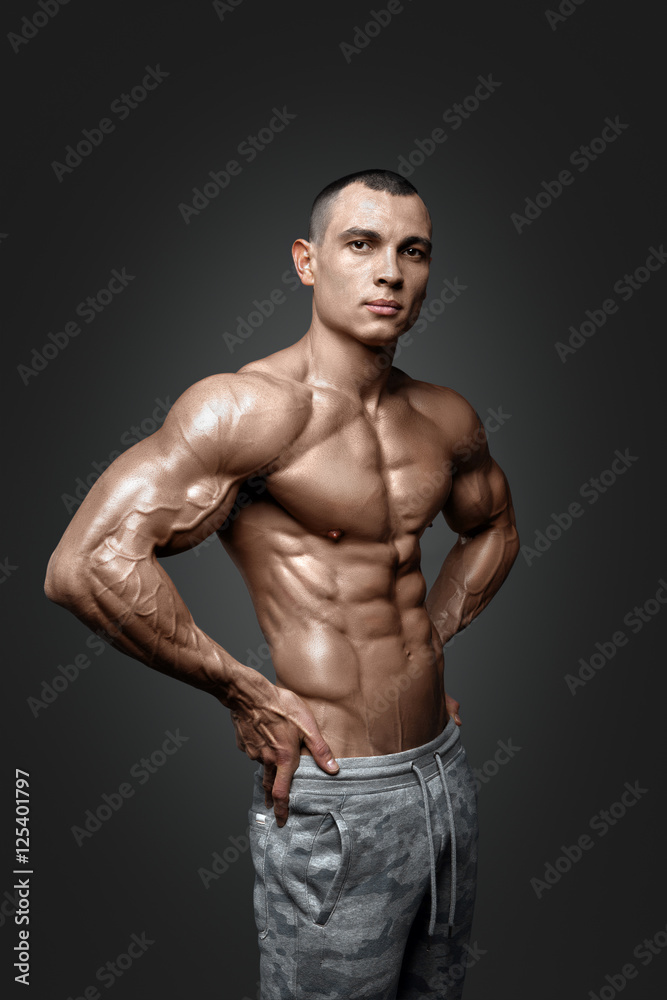 Strong Athletic Man Fitness Model Torso showing six pack abs.