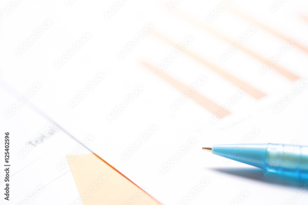 Office work space with paper chart and office accessories Office work space with paper chart and office accessories