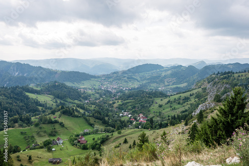 View to the carpathian mountains and romanian village from the t © Martins Vanags