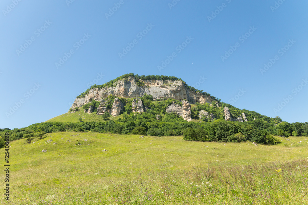 Rock Cizinci around the farm Kizinka on a hot summer day. Russia, Labinsk district of Krasnodar region