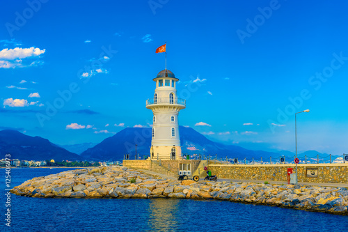 Lighthouse in the port of Alanya at sunset