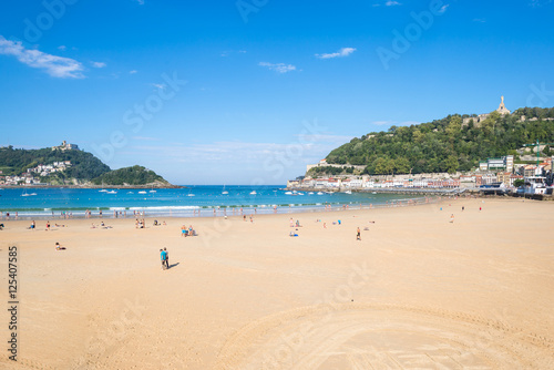 The Beach of La Concha Donostia, a sand beach with shallow waters and tide. It is one of the most famous urban beaches in Europe. Donostia San Sebastian is European Capital of Culture 2016