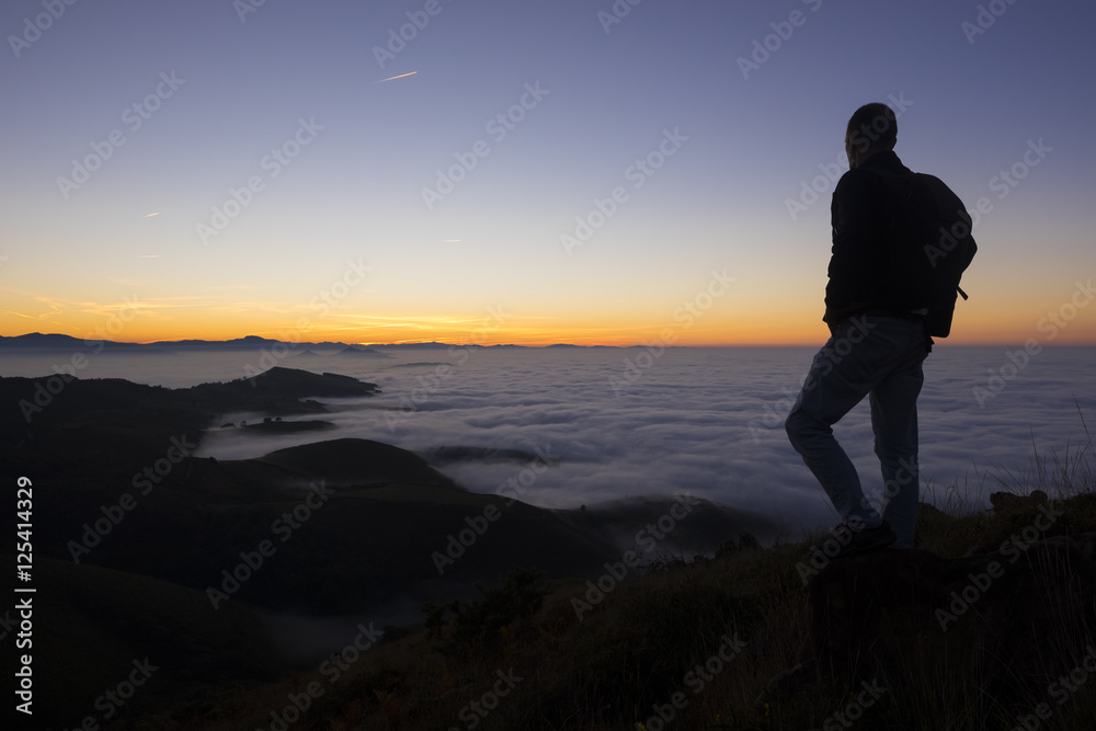 Man playing sports on the mountain Man playing sports on the mountain