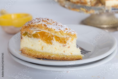 cheesecake with peaches in syrup