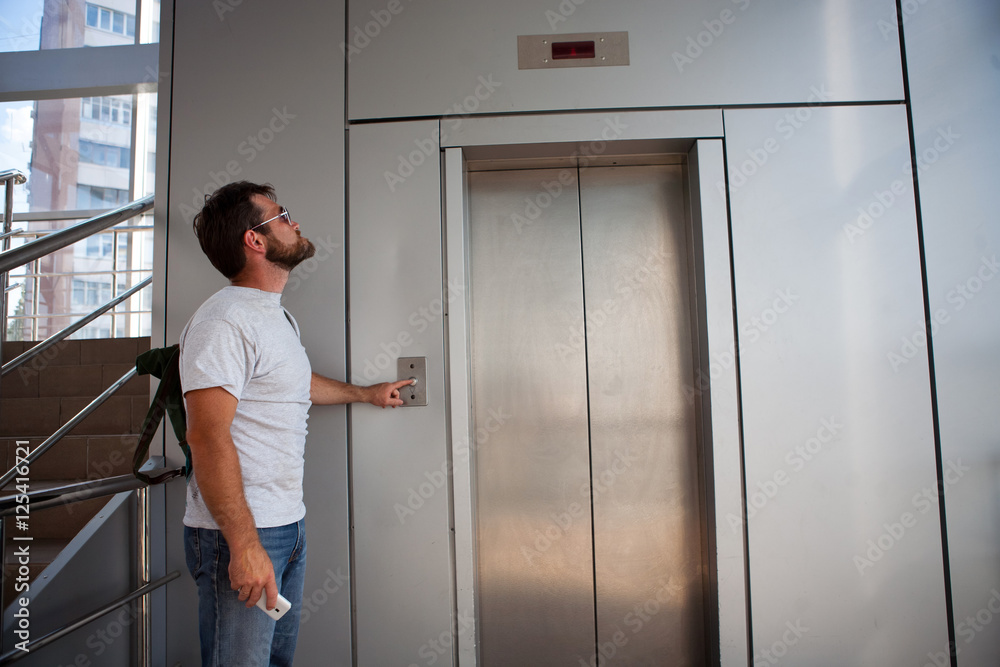 man waiting for his flight in the airport and calling man waiting for his flight in the airport and calling