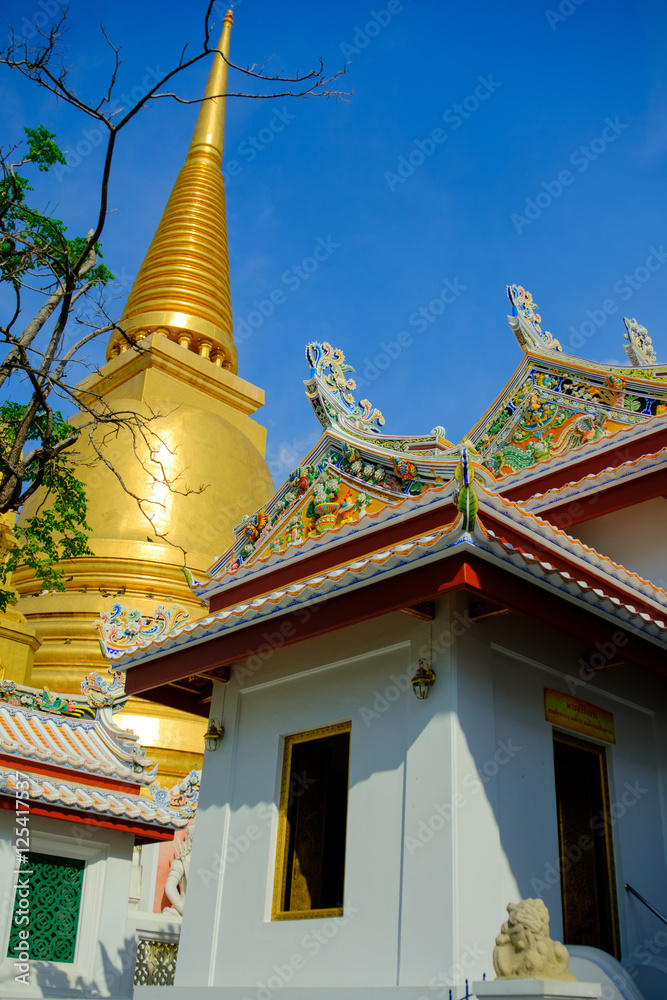 Fototapeta premium Beautiful of golden pagoda and thai art architecture in Wat Bovoranives, Bangkok, Thailand.