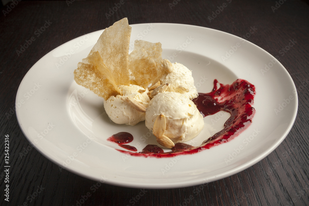 ice cream topped with raspberries.. ice cream topped with raspberries..