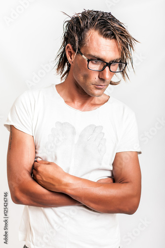 Portrait of a Confident Man Wearing Glasses © Lambros Kazan