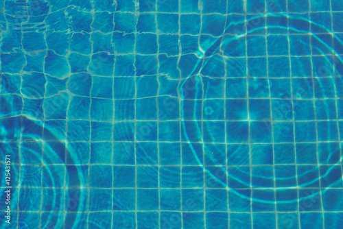 Background of rippled water in swimming pool. top view
