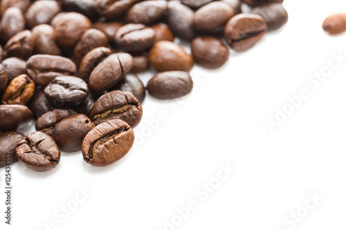  Roasted coffee beans on white